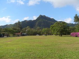 El Valle de Anton large grassy yard with mountains in the distance – Best Places In The World To Retire – International Living